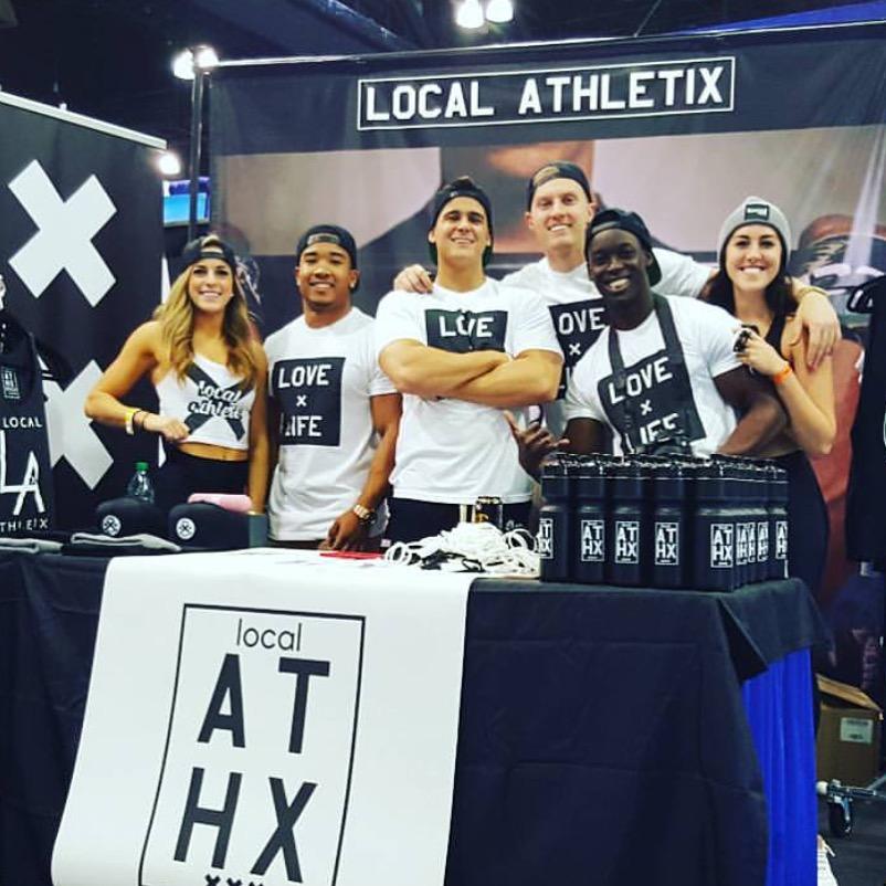 The+Local+Athletix+team+at+their+booth+at+the+LA+Fit+Expo.+The+expo+took+place+Jan.+22-24.+Photo+courtesy+of+Local+Athletix.+