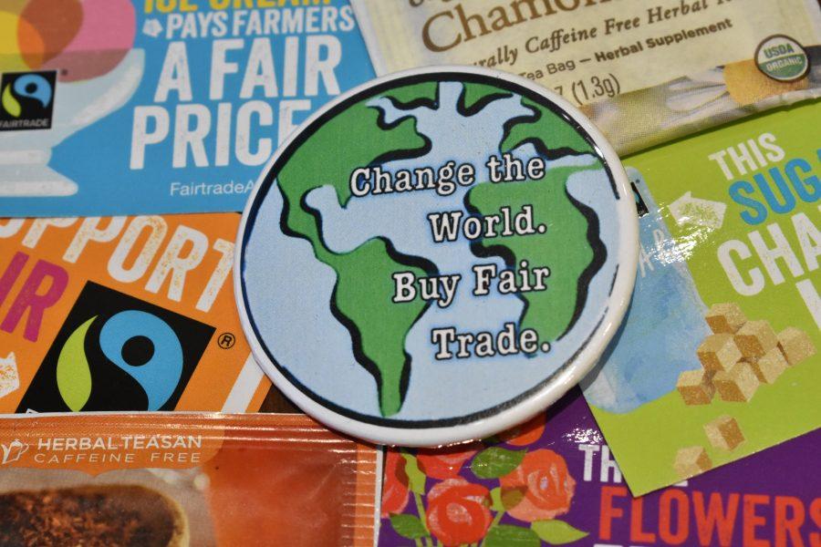 The CSU Fair Trade Club gives out free pins, stickers, and tea bags when they have a table at events. Photo credit: Kelly Peterson