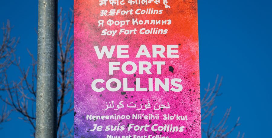 The current version of the banner seen outside of Fort Collins City Hall. The banners will soon be taken down and updated with two more languages. Photo credit: Tony Villalobos May