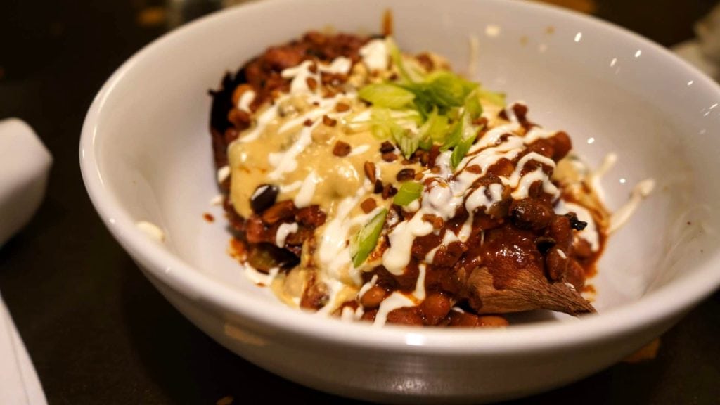 Tasty Harmony's baked yam with chocolate chili and cashew cheese.