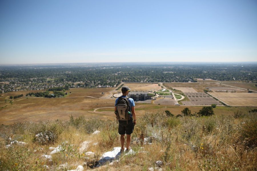 student looking out over Fort Collins