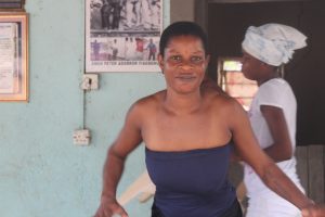 Millicent’s mother dances on the porch.