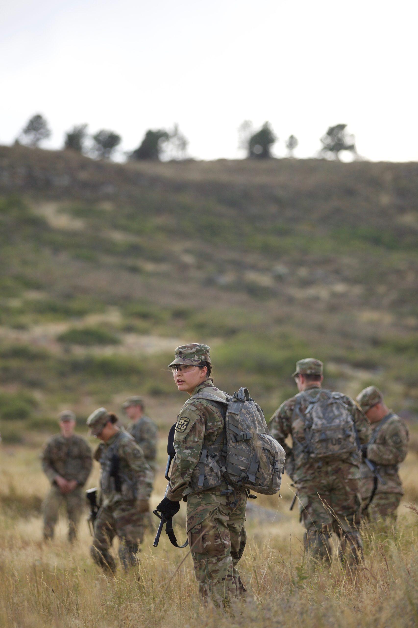 group of students in military uniform in field