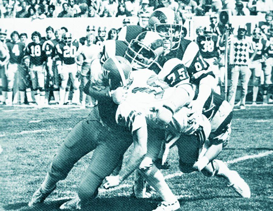 Colorado State University football players tackle a player from the University of Las Vegas, Nevada during the 1981 homecoming game. (Photo via Silver Spruce)