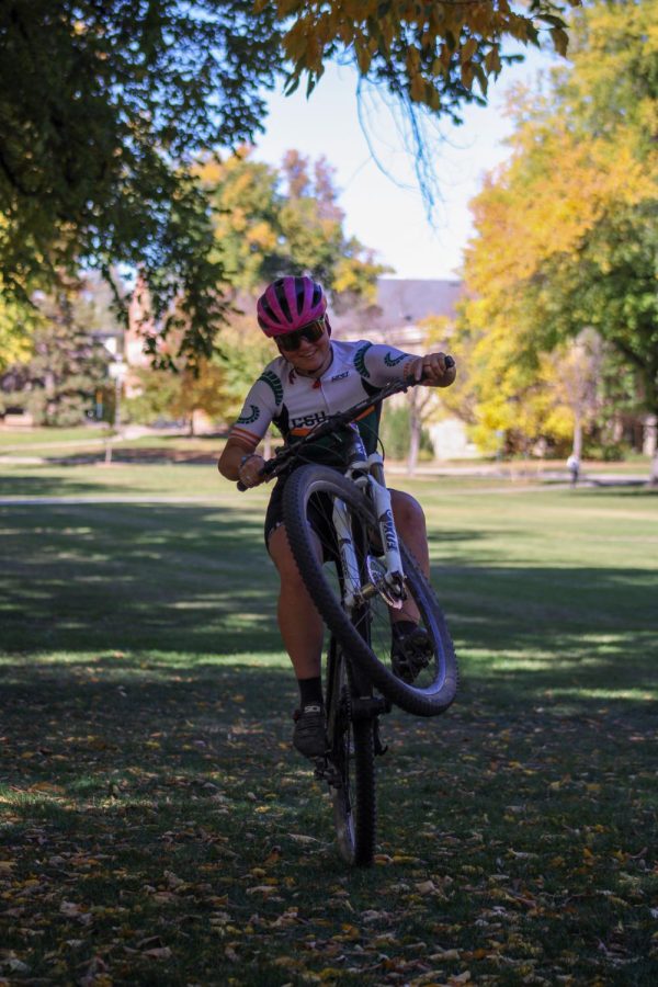 Isabel Naschold performs a wheelie in the CSU Oval.