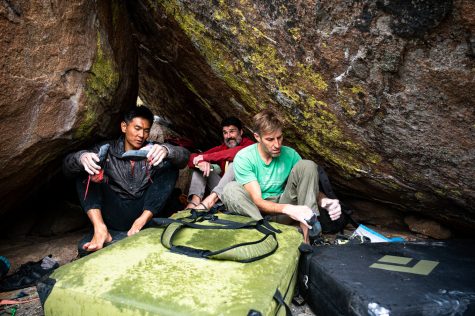 Dan Yager, Jason Tarry and Ben Scott take shelter.