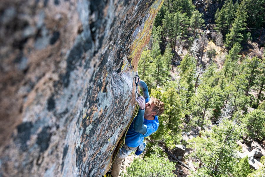 Ben Scott clips on an unclimbed project.