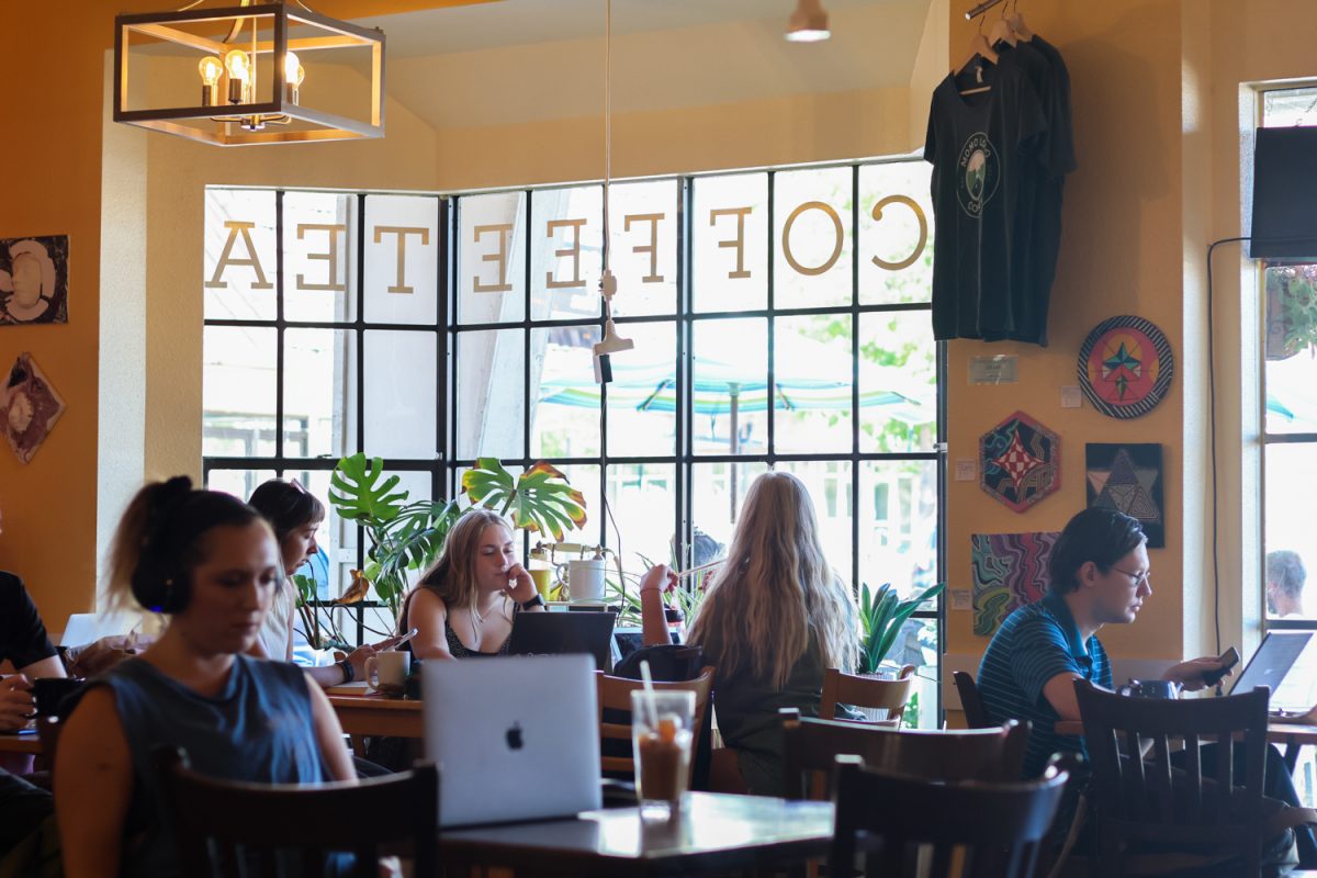 A group of students enjoy their drinks, as they study at Momo Lolo Café, Sep 8. Momo Lolo is opened from 6:30 a.m. to 6:00 p.m. daily.