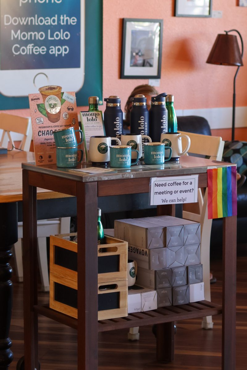 A stand is set up inside Momo Lolo Café to promote their merch along with their coffee boxes for meeting or events, Sep. 8. Momo Lolo Café offers coffee-to-go boxes that hold 96 ounces of fresh-brewed coffee, serving 10-12 people.