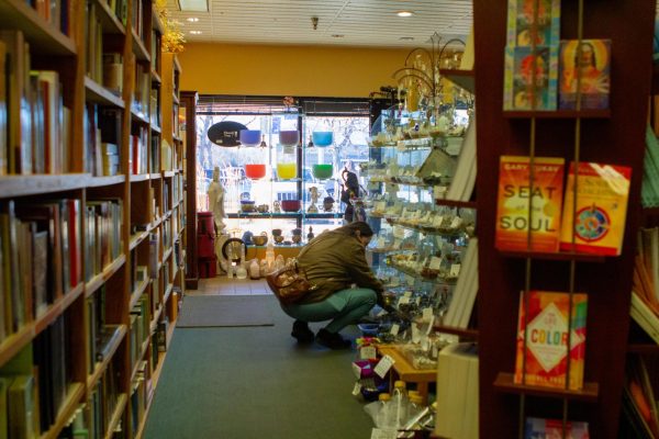 A customer browses through crystals at Northern Lights Crystals, Books & Gifts in Fort Collins, CO Jan. 27.