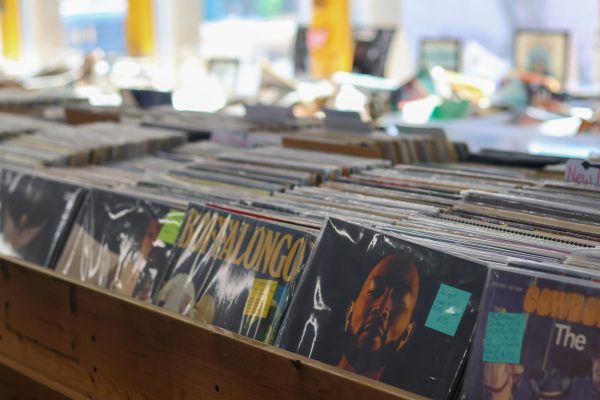 Records fill a wooden rack at the record store Bizarre Bazaar, Feb 5.