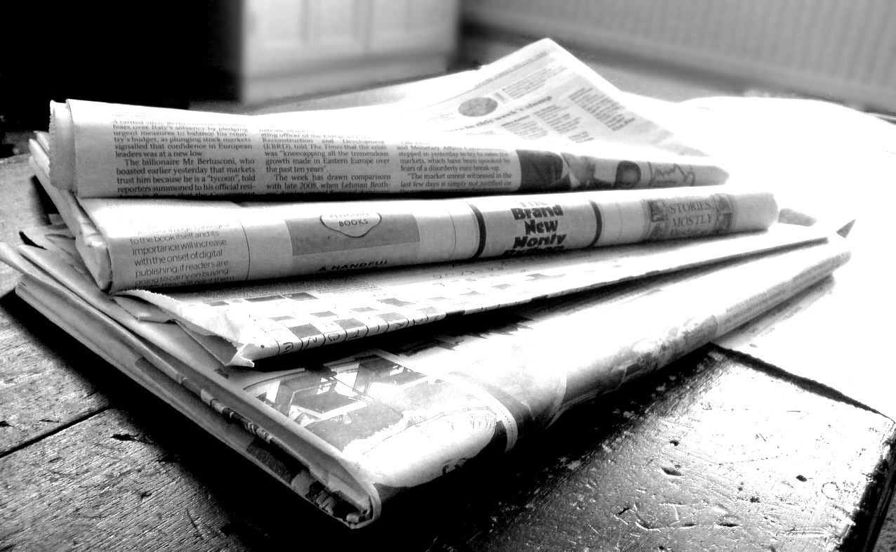 Newspapers in black and white Aug. 11, 2011. Photo courtesy of Jon S. via flickr.