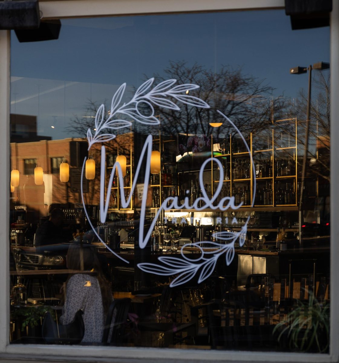 A view of the dimly lit full bar in Maida Trattoria in Fort Collins, Colo, Feb. 5.