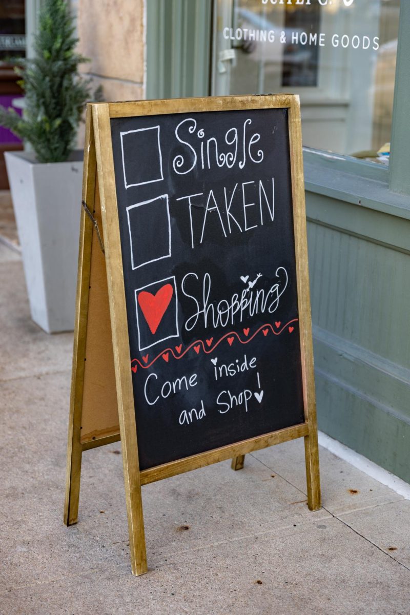 Sunday Supply Co. drawing in shoppers with a Valentine's Day themed sign, Fort Collins, Colo, Feb. 5.