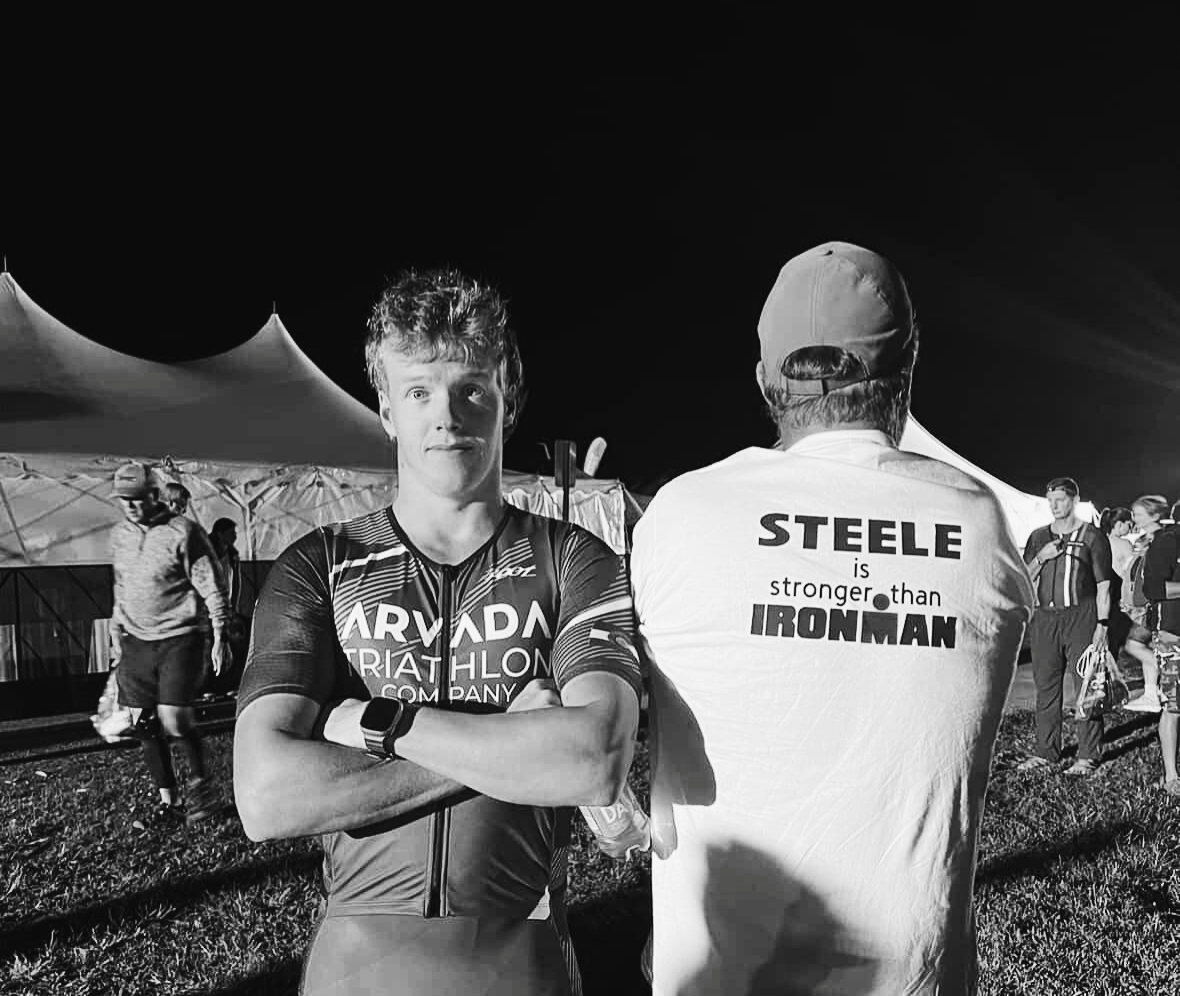 Trenton and his dad pose together featuring their family shirt.
Photo courtesy of Steele Family